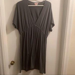 Grey jersey knit dress with elastic waist and deep vneck